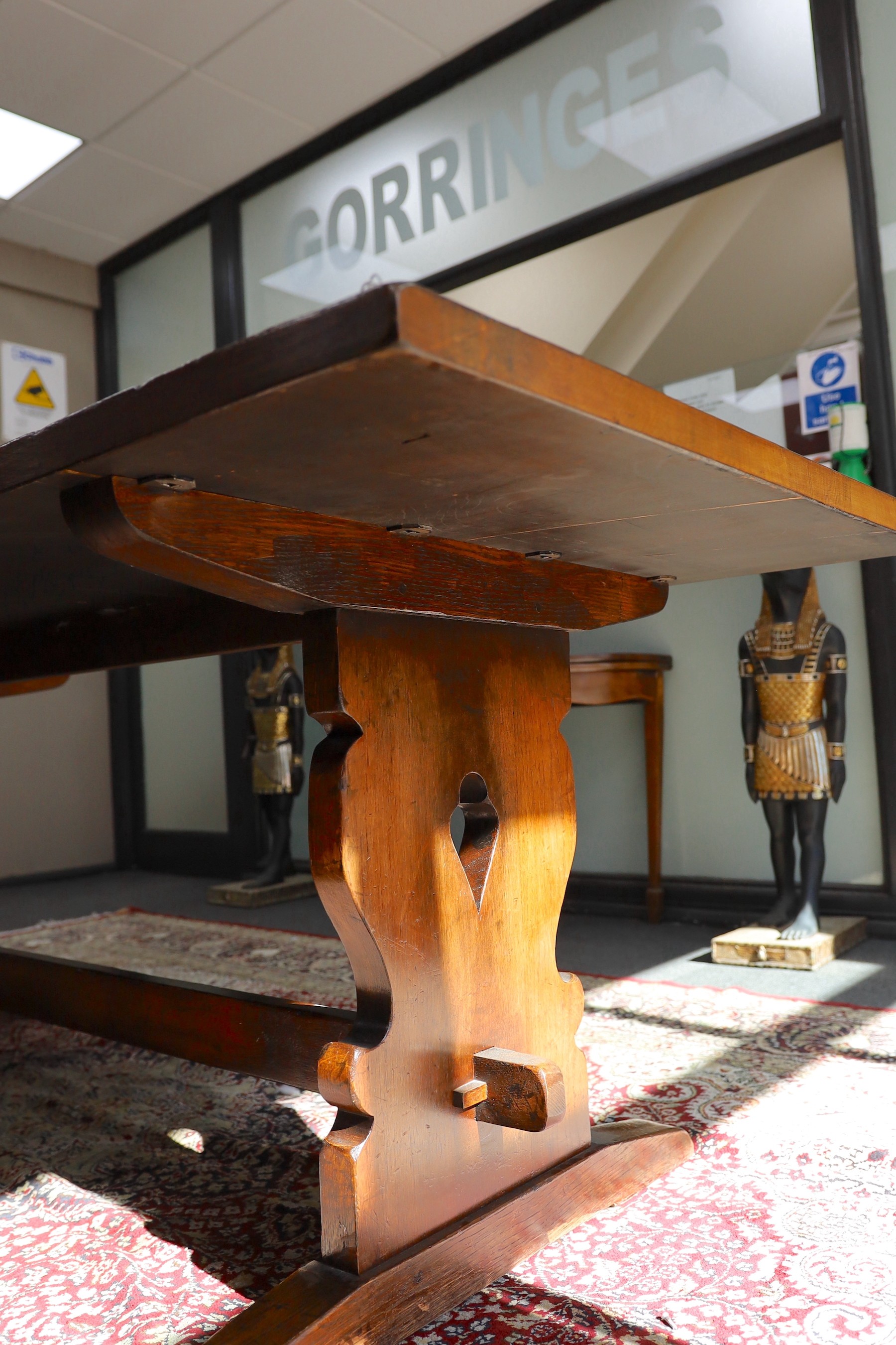 A Titchmarsh and Godwin rectangular oak refectory dining table, length 213cm, width 90cm, height 78cm